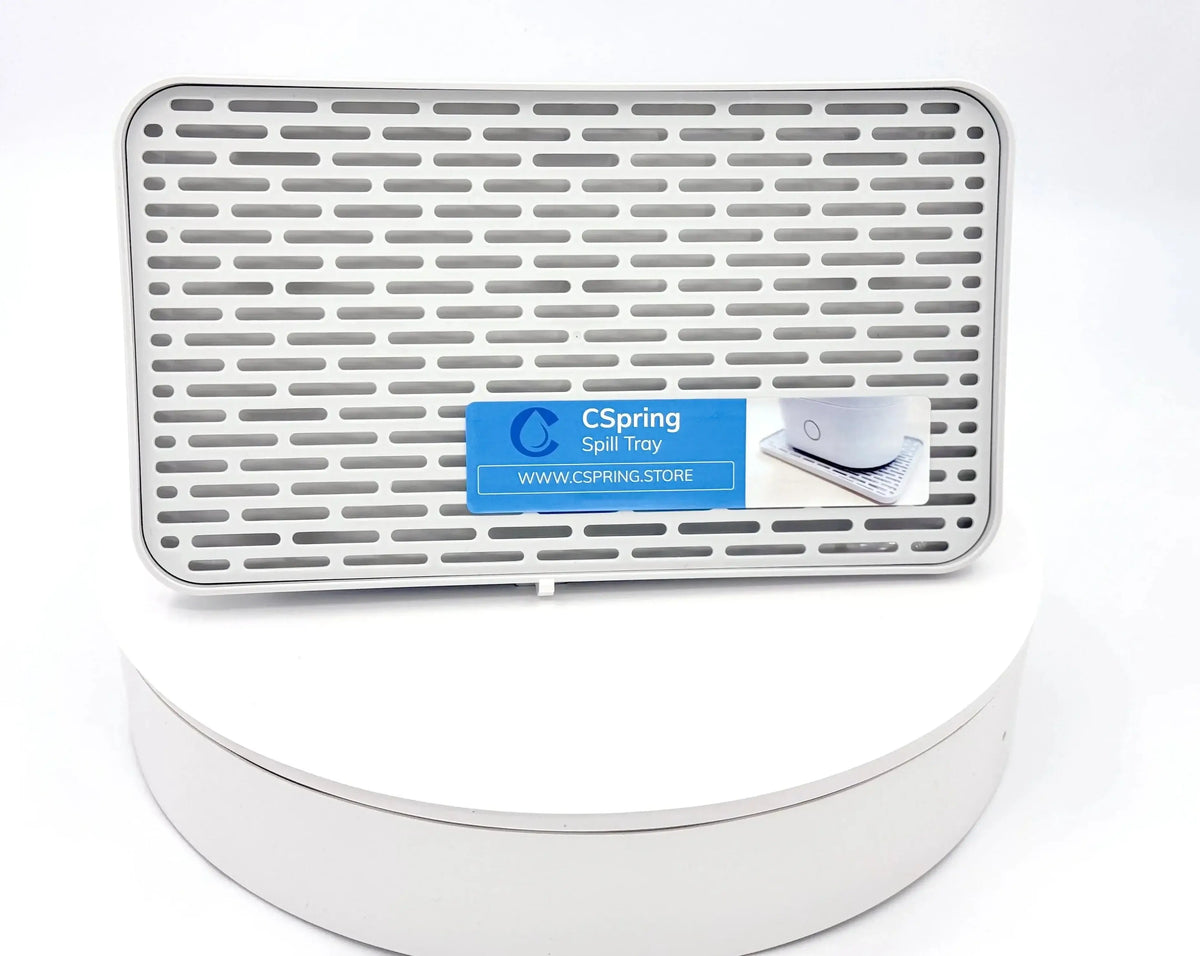 Spill protection tray for CPAP & CSpring